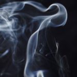 Monochrome Magic - Abstract black and white backdrop of translucent fume with curves and swirls on black background